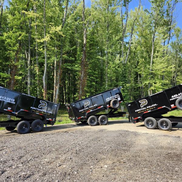 dumpster trailer with dump bed up